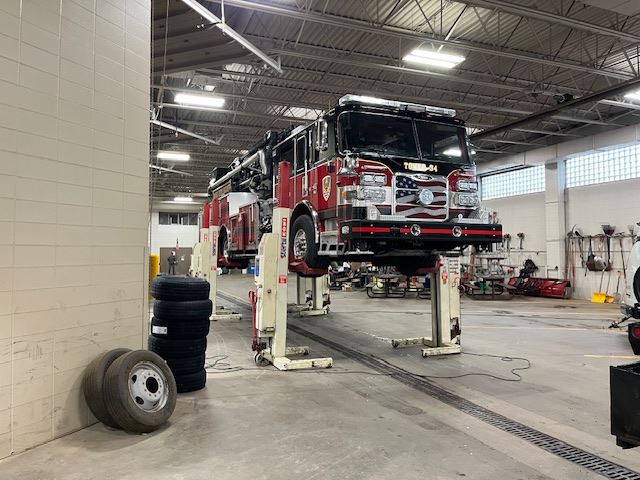 Fire Engine on Lift Seen From Front