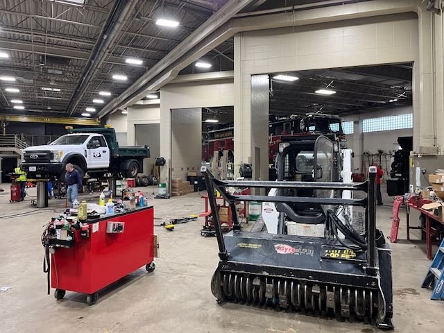 Rows of Vehicles Being Worked on