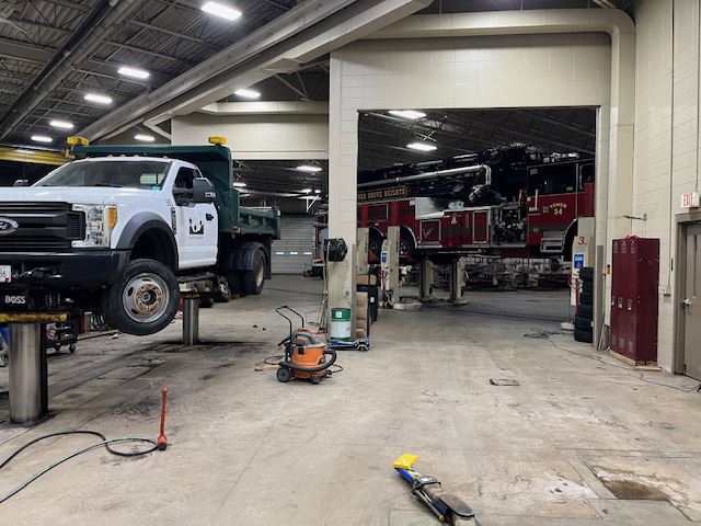 Fire Engine and Truck on Lift