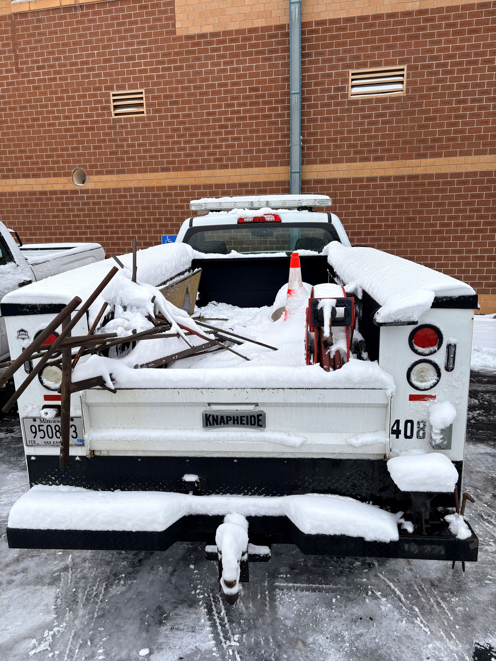 Truck covered in snow