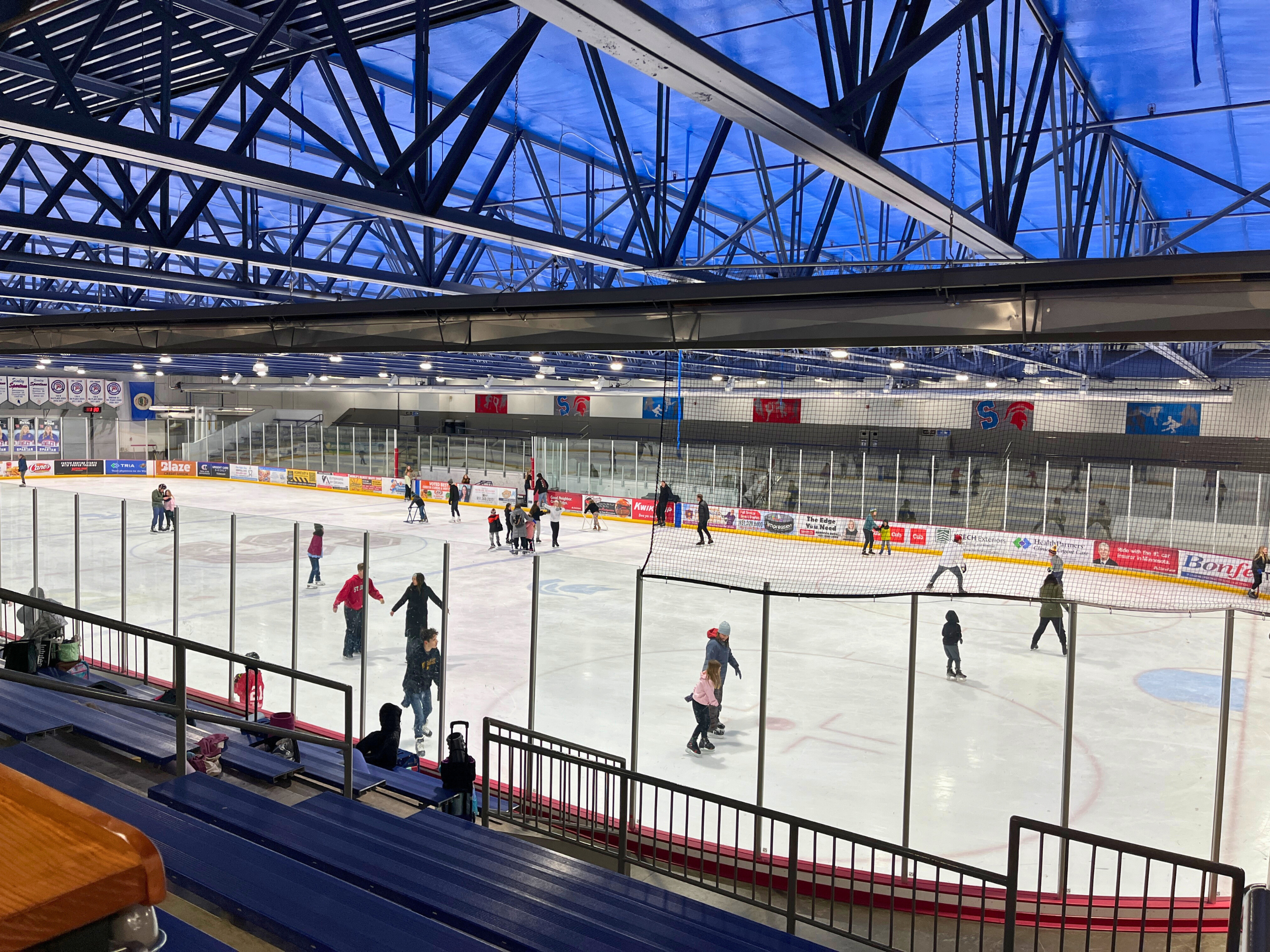People ice skating on the east rink.